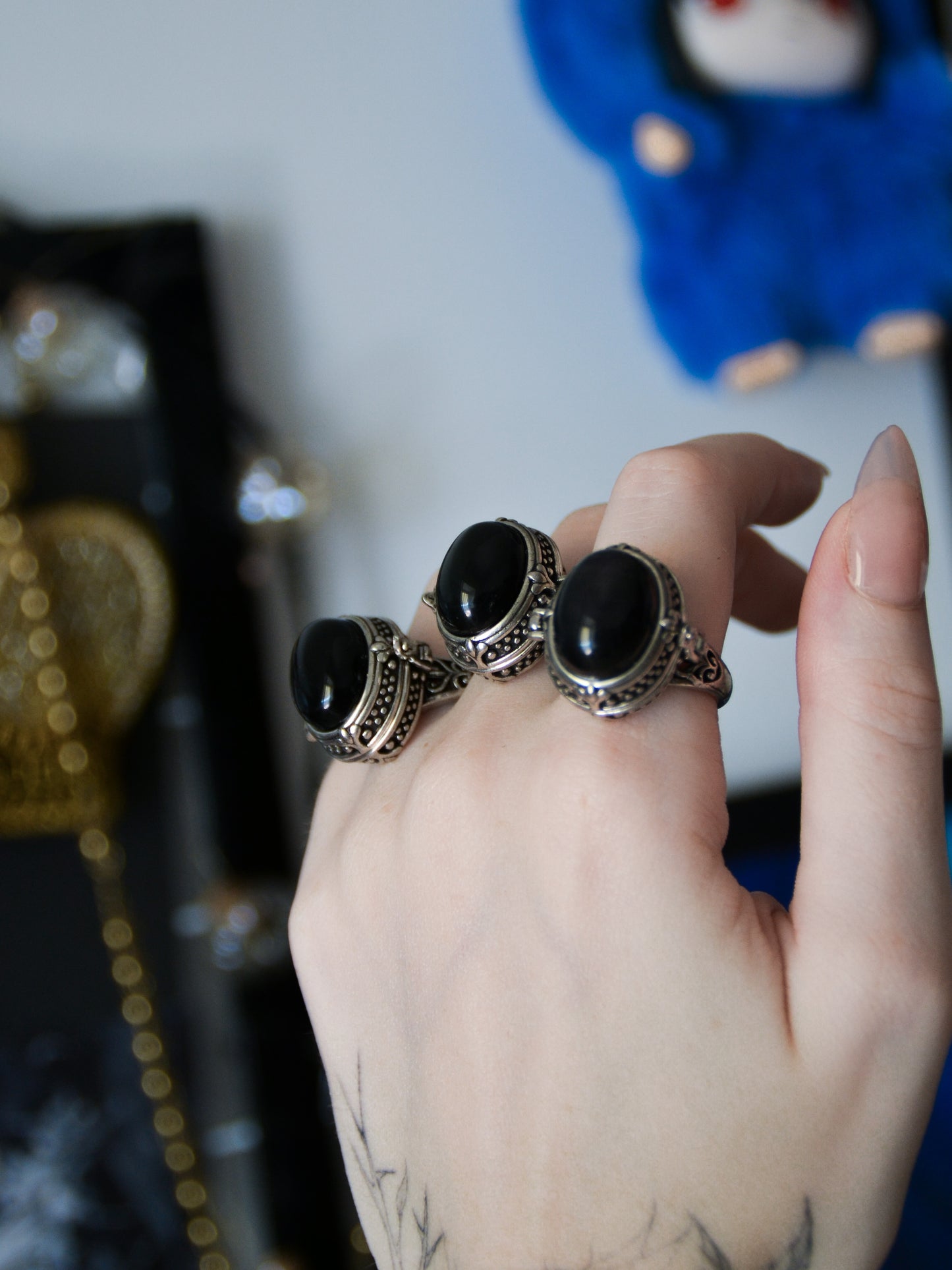 Anello poison con ossidiana arcobaleno