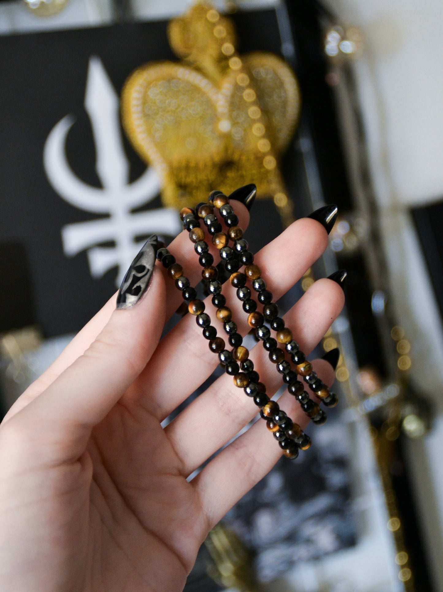 Bracciale in biglie di occhio di tigre, ematite e ossidiana nera
