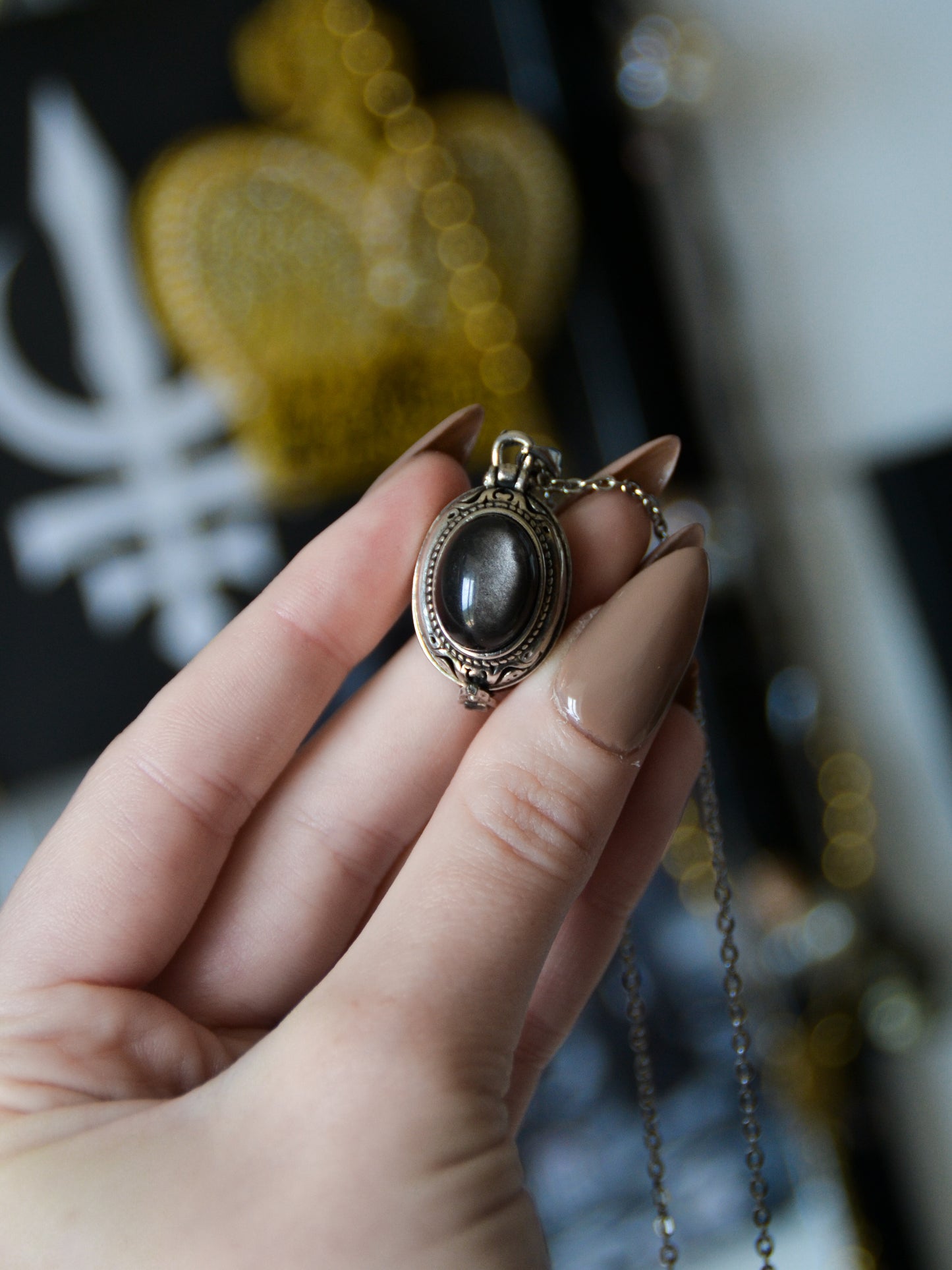 Ciondolo locket con ossidiana argentata
