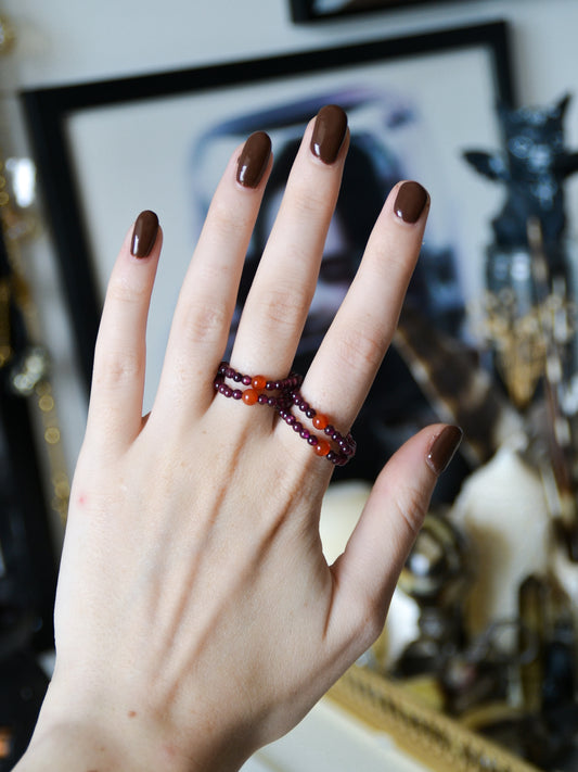 Anello elastico in granato + corniola