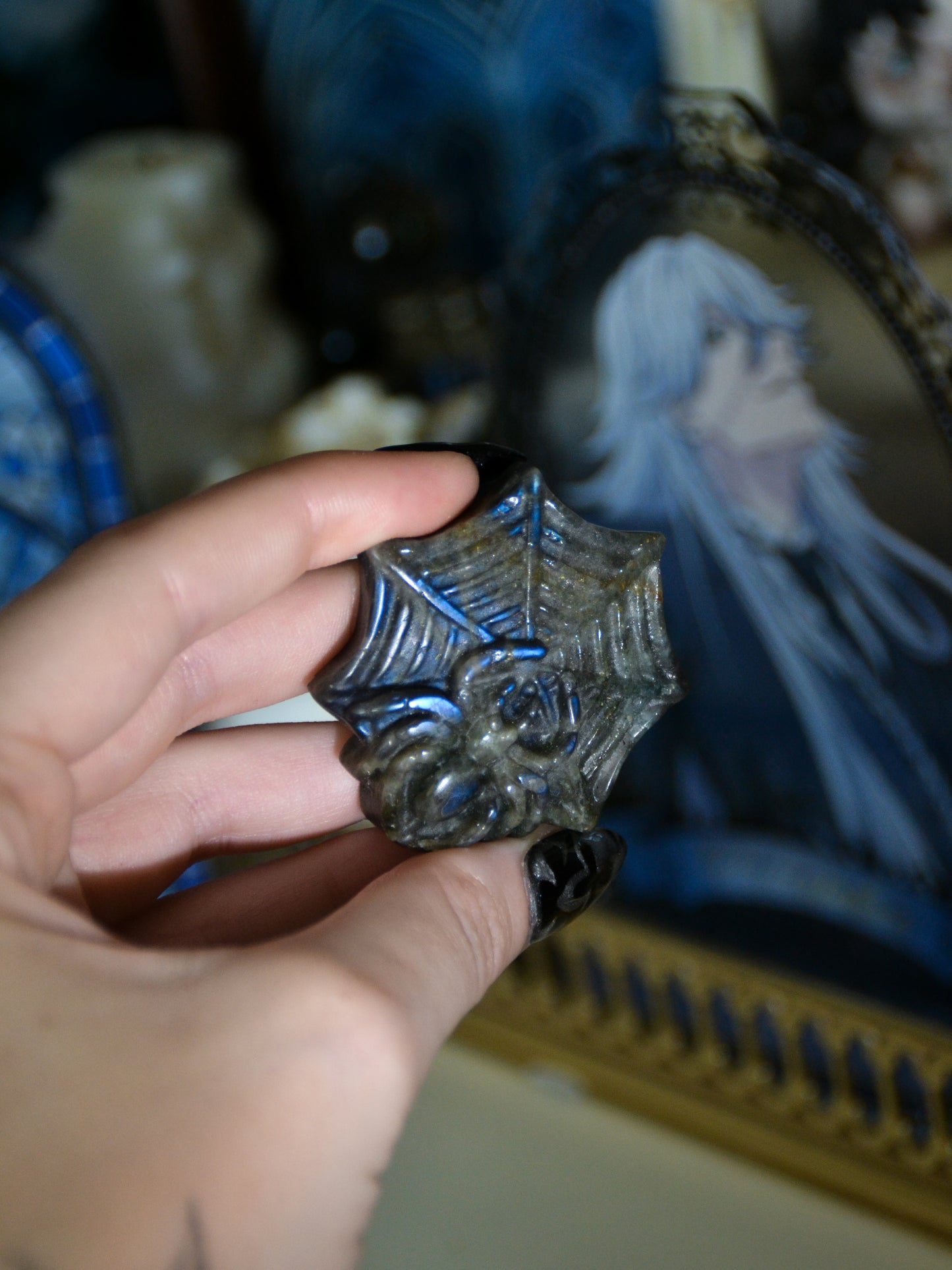 Ragno con ragnatela in labradorite