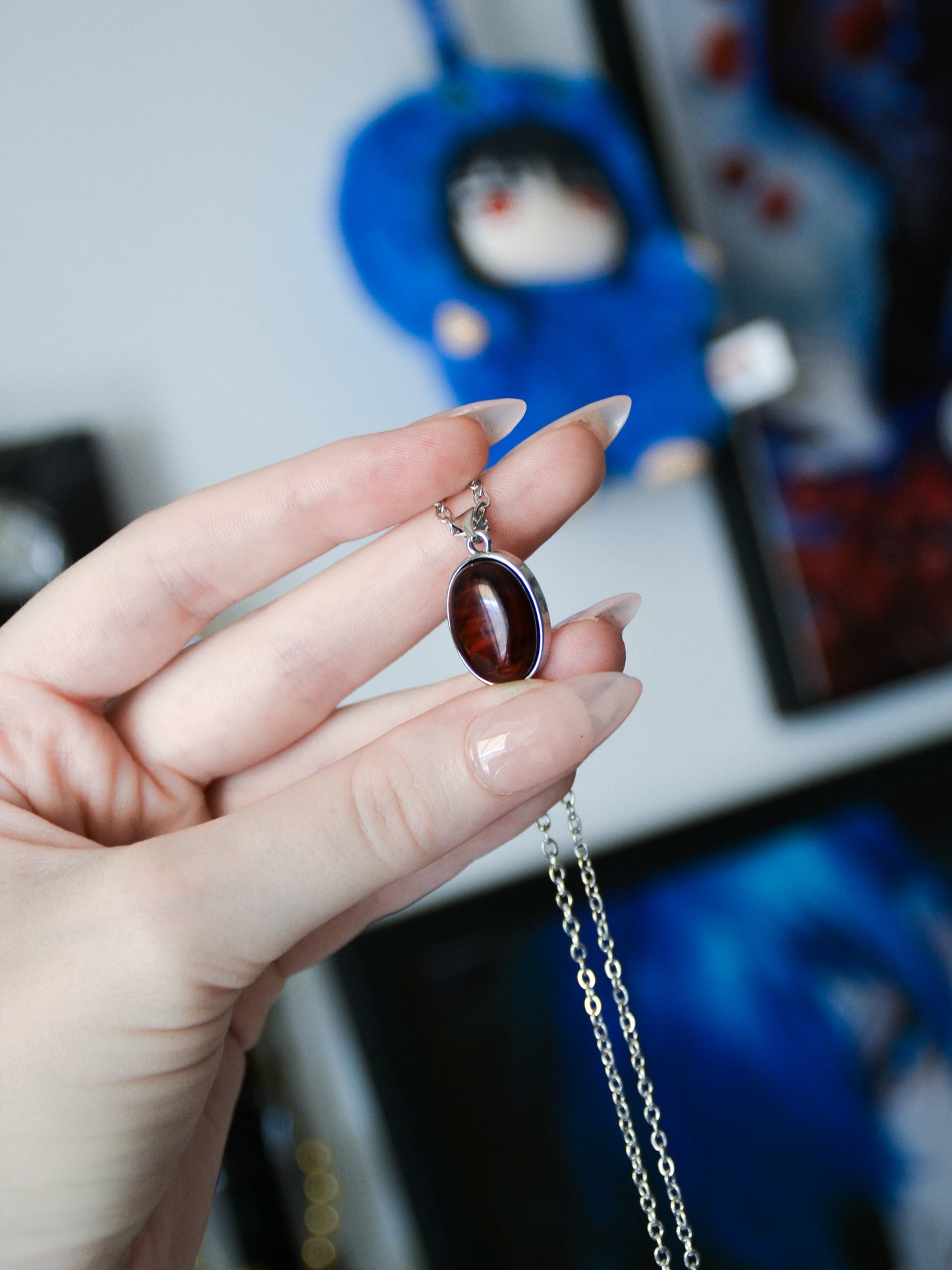 Ciondolo in blood amber