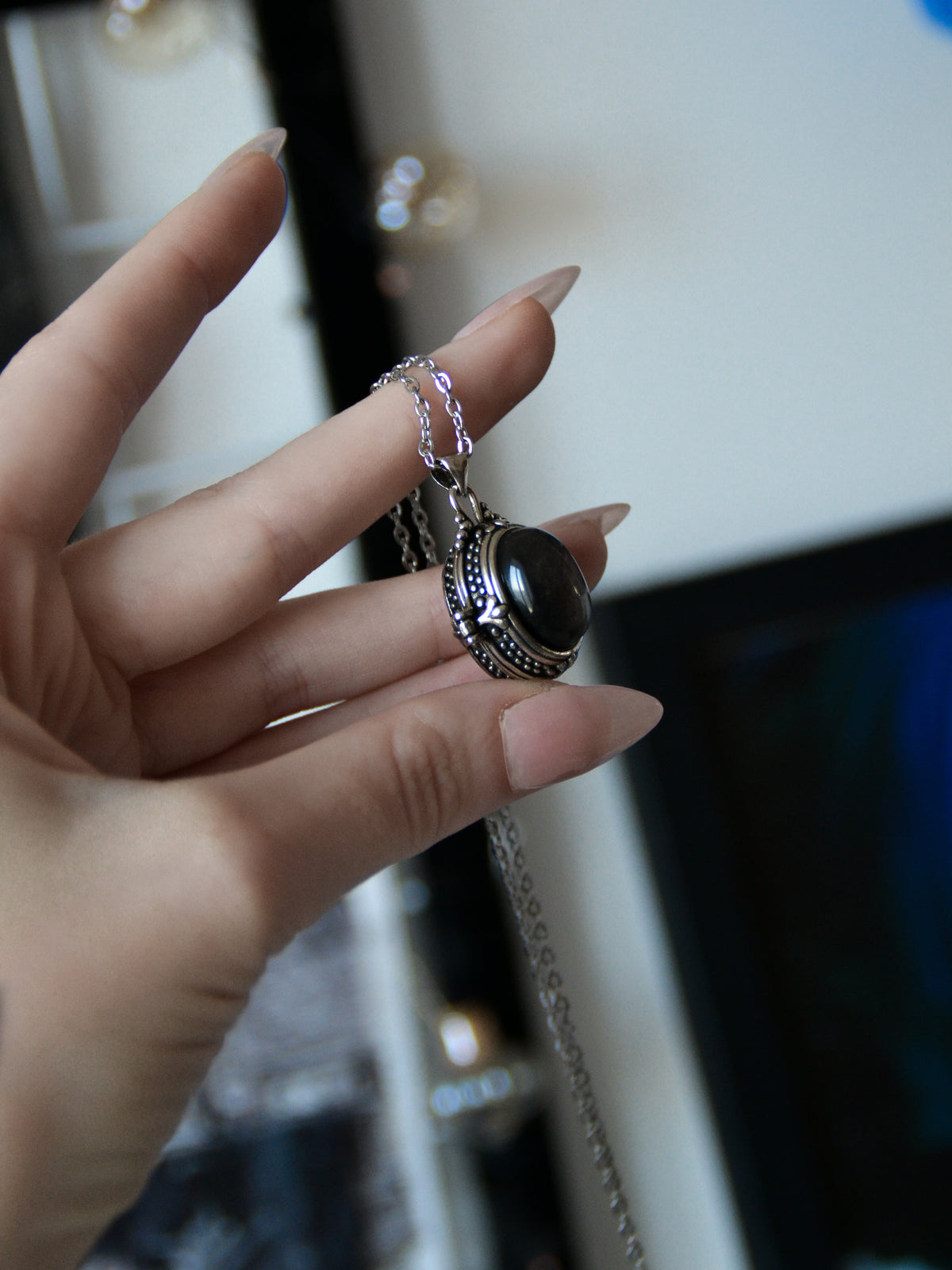 Ciondolo poison locket con ossidiana argentata