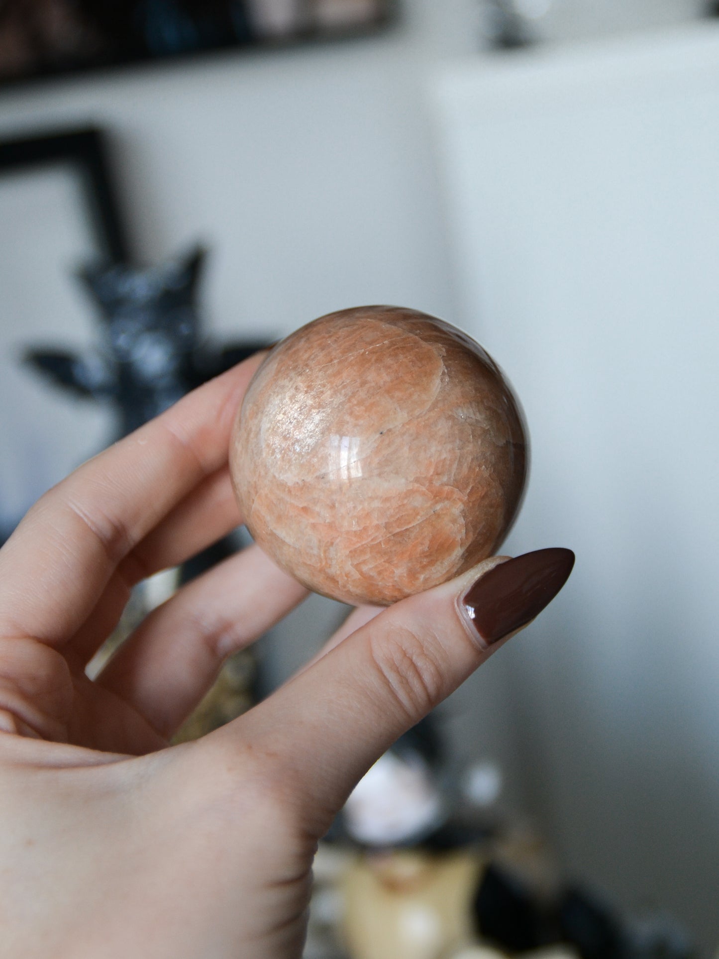 Sfera in pietra di luna pesca